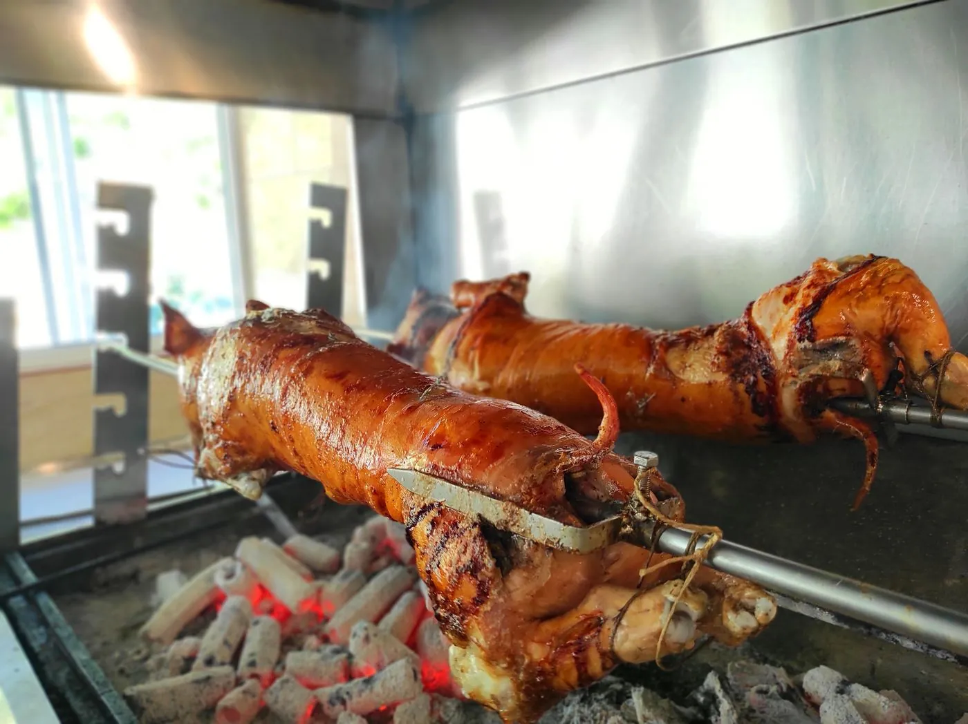 Piglets on spit